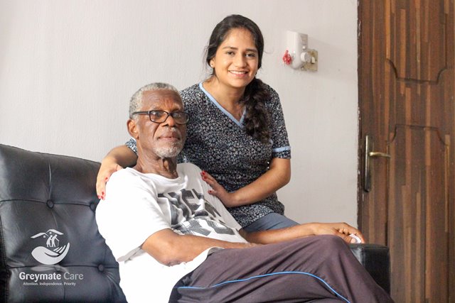 greymate with an elderly person